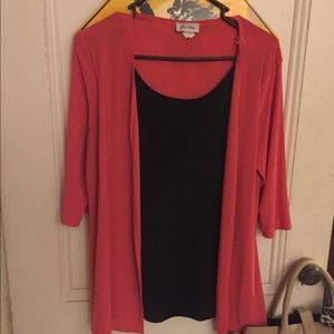 Black tank top connected to pink cardigan